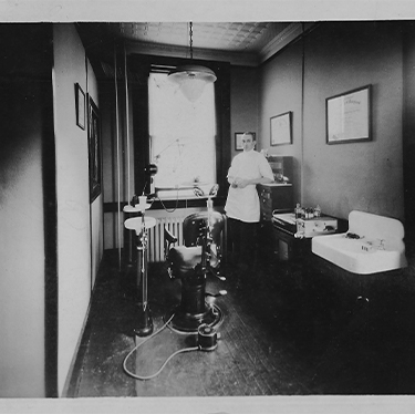 Doctor James W McCarl in original Greenbelt dental office in 1924
