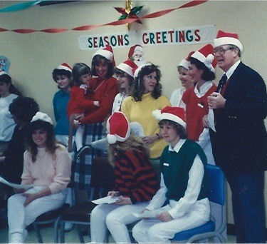 The McCarl Dental Group dentists and team caroling in 1997