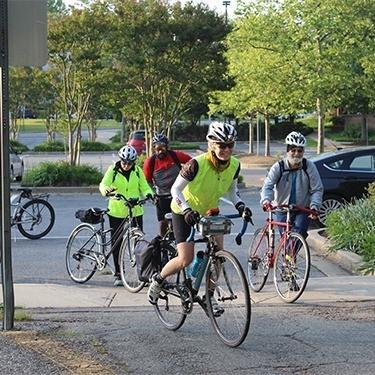 Group of bike to work week participants riding to work