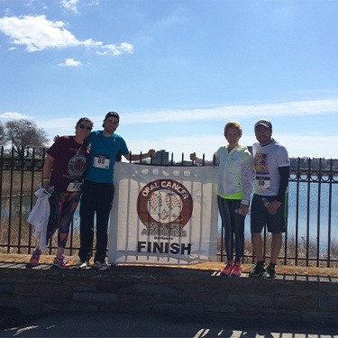 Oral Cancer Walk participants posing at finish line