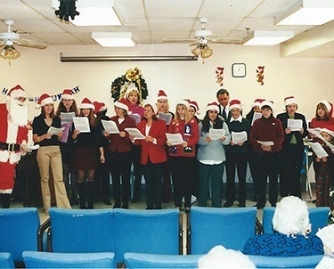 Vintage-Photos-McCarl-Dentists-Team-Caroling-2001.jpg