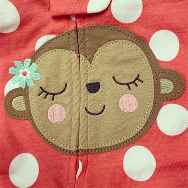 Pajama shirt with smiling monkey