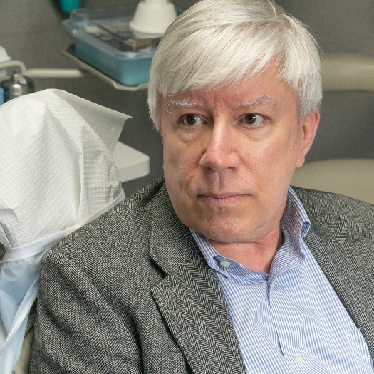 Senior man sitting in dental chair