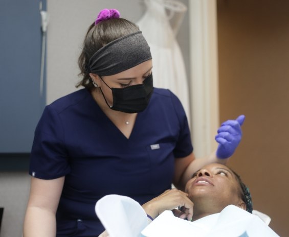 dental team member treating a patient