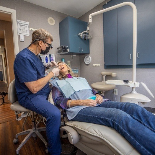 Woman receiving a dental exam