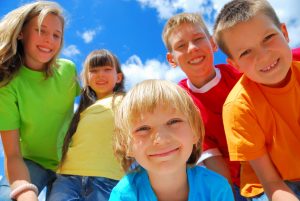 Group of happy kids outdoors