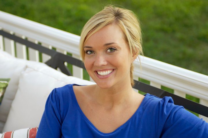 female patient in blue blouse at McCarl Dental Group